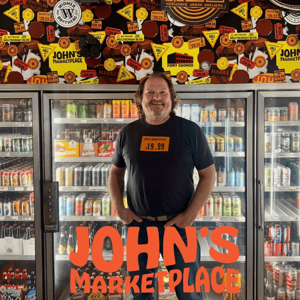 A man stands in front of a cooler at a store