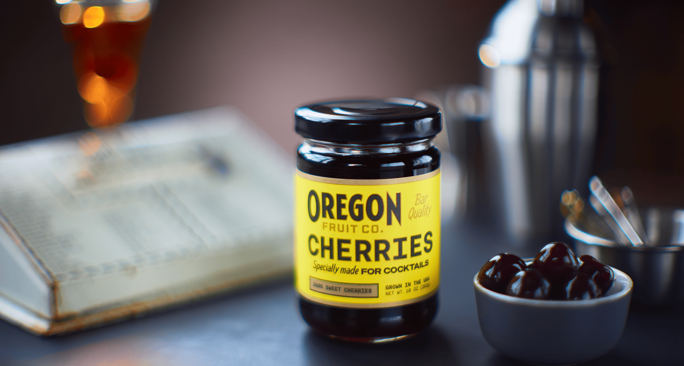 Oregon Fruit cocktail cherries jar with a bowl of cherries