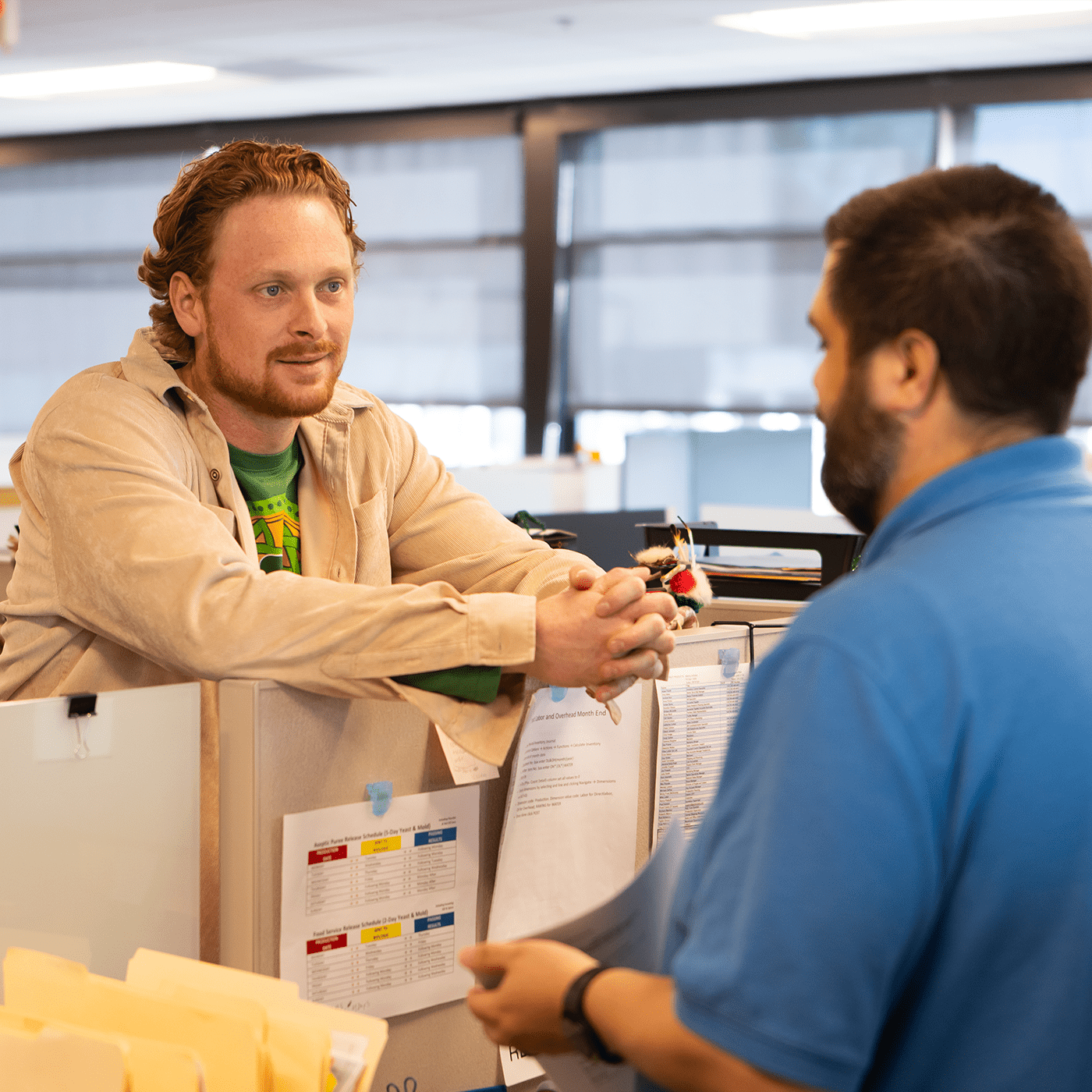 Two Oregon Fruit employees collaborating