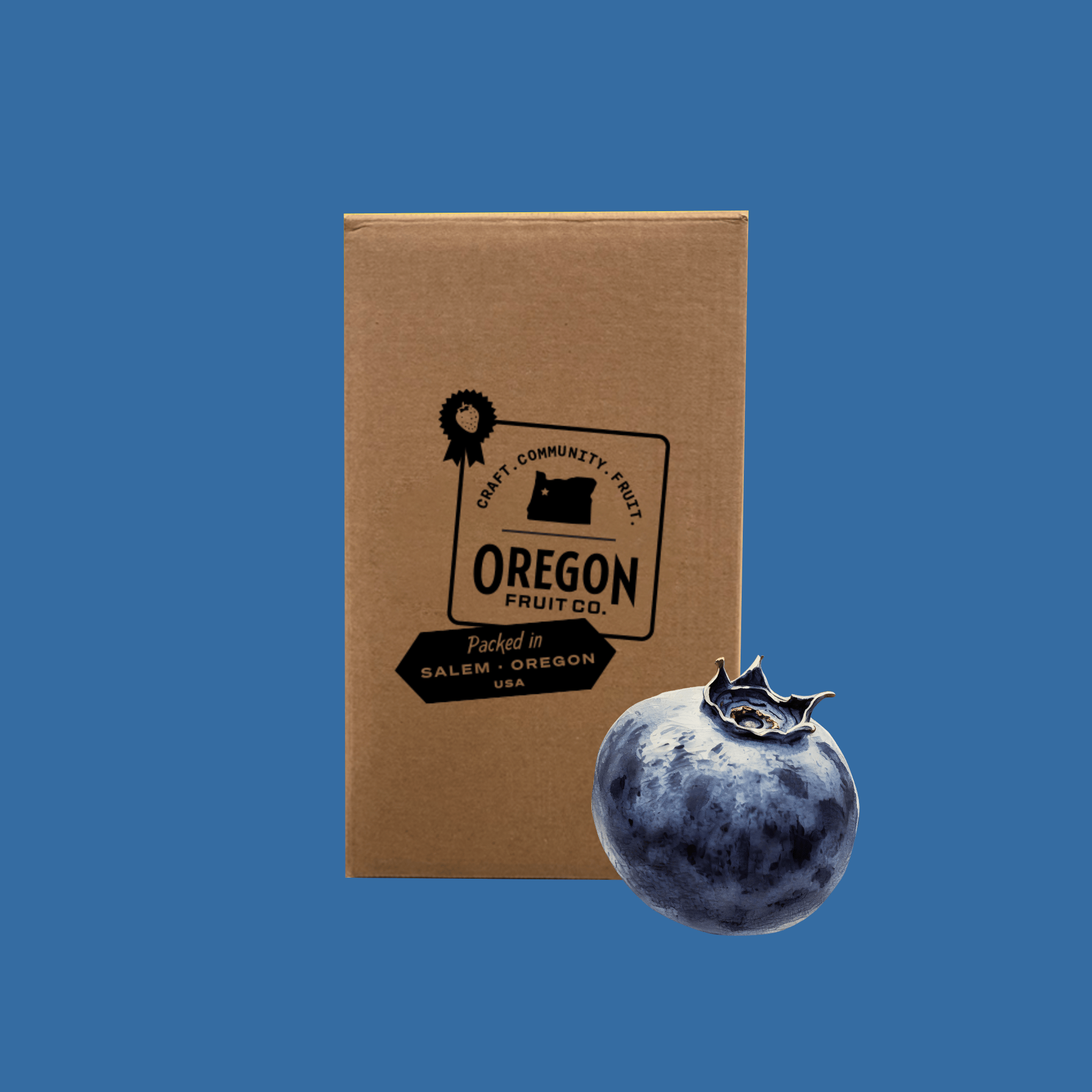 A brown cardboard box with a black 'Oregon Fruit Co.' label stands against a solid blue background, with a single blueberry placed in front of the box.